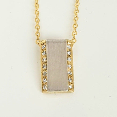 18ct two tone Diamond pendant.