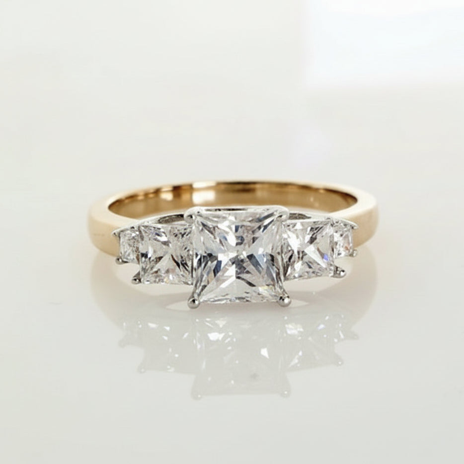 9ct yellow gold CZ ring.
