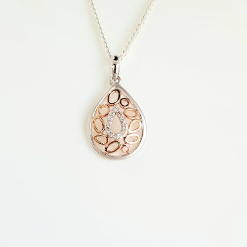 9ct white gold & rose gold Diamond pendant.