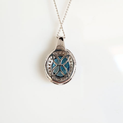 9ct white gold Topaz and Diamond pendant.