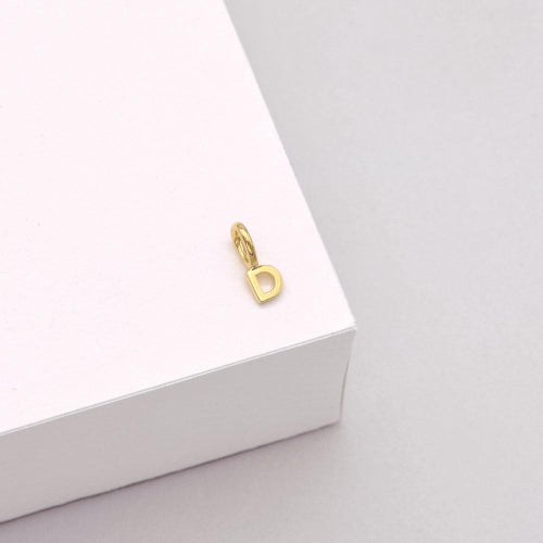 9k Tiny Letter Charm D