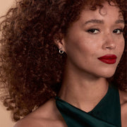 Gold plated curl earrings