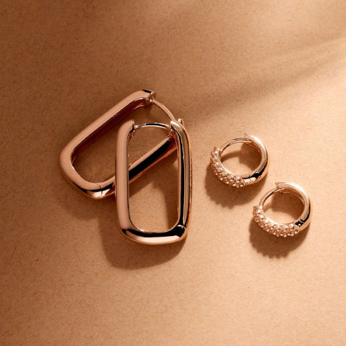 Rose gold huggie earrings