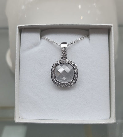 Kagi white crystal pendant