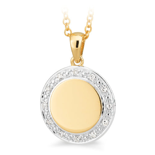 9ct diamond set disc pendant.