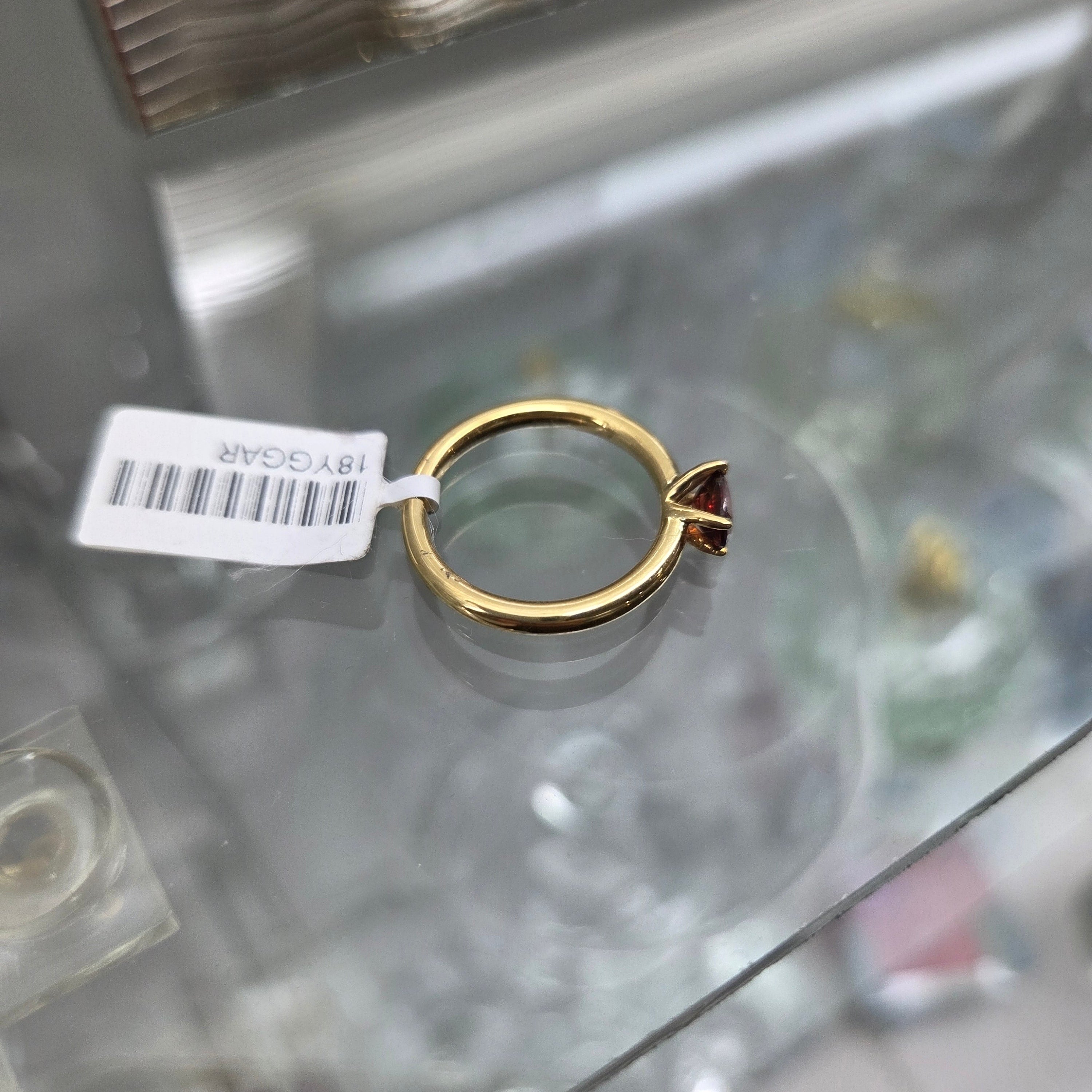 18ct East West Set Garnet