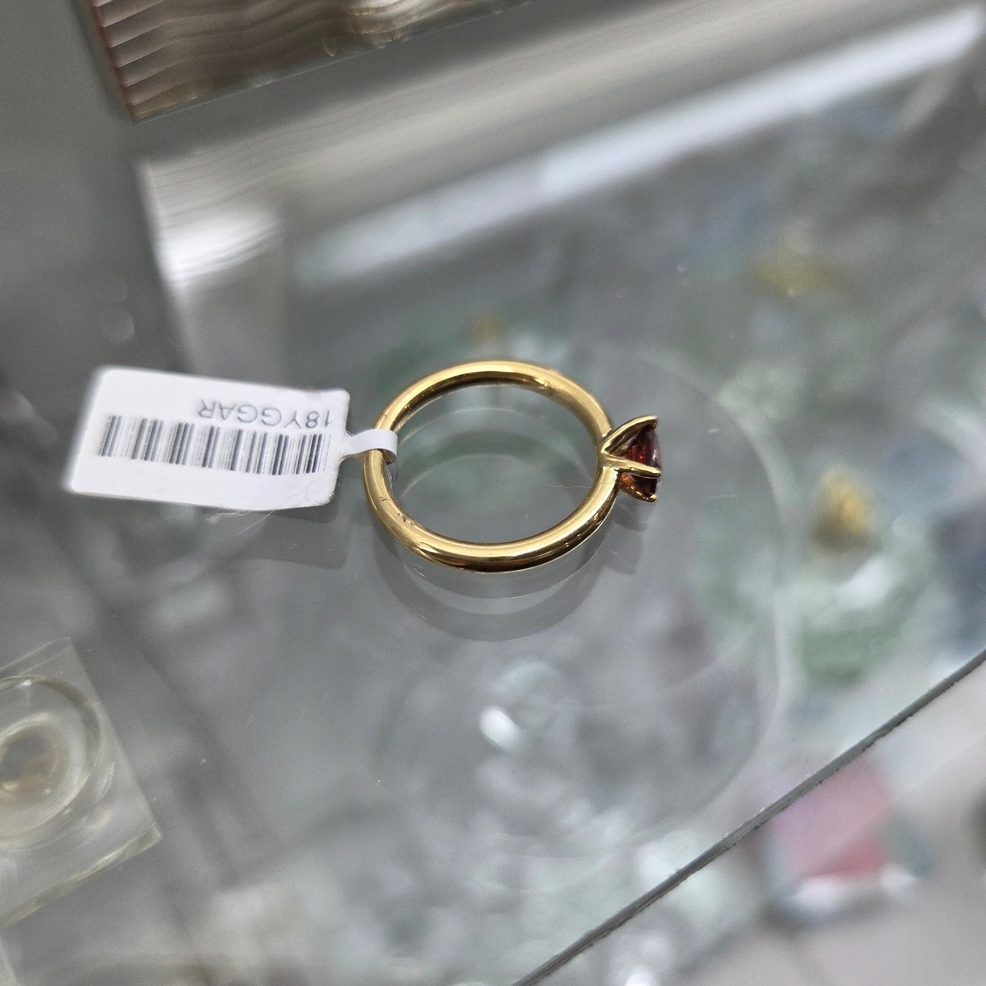18ct East West Set Garnet