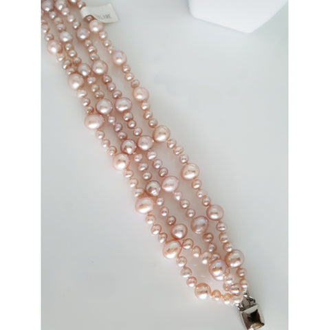 Pink pearl 4 row bracelet with sterling silver clip.
