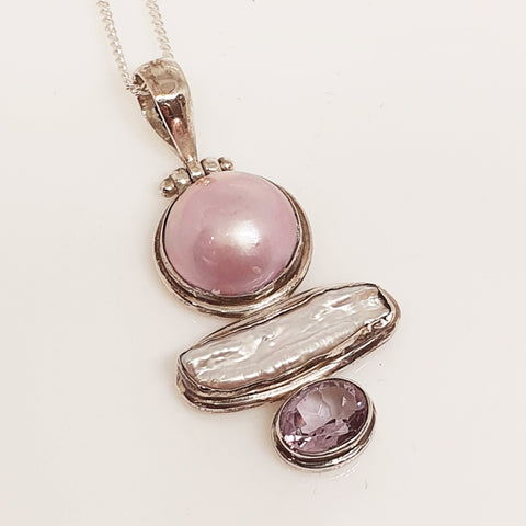 Sterling silver pearl and gem pendant