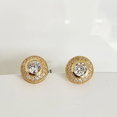 Sterling silver gold plated CZ studs.