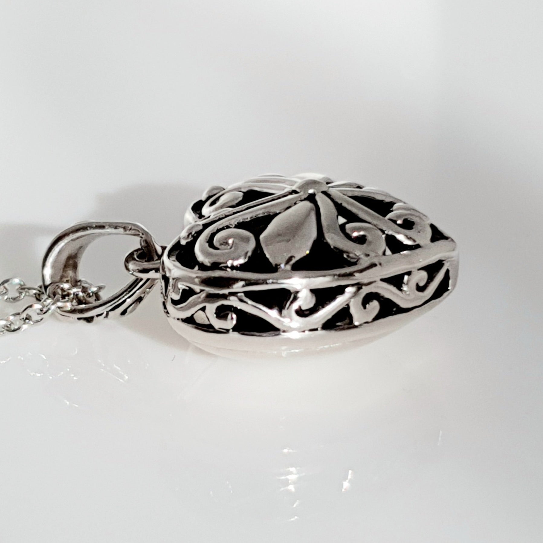 Sterling silver puff heart pendant
