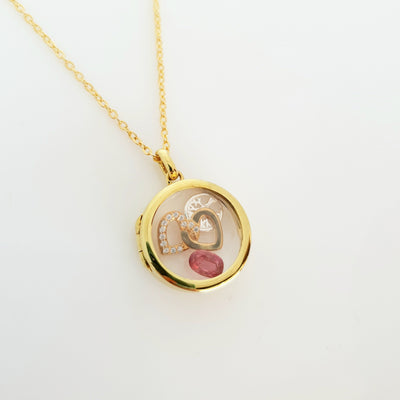 Sterling silver gold plated 20mm  locket.