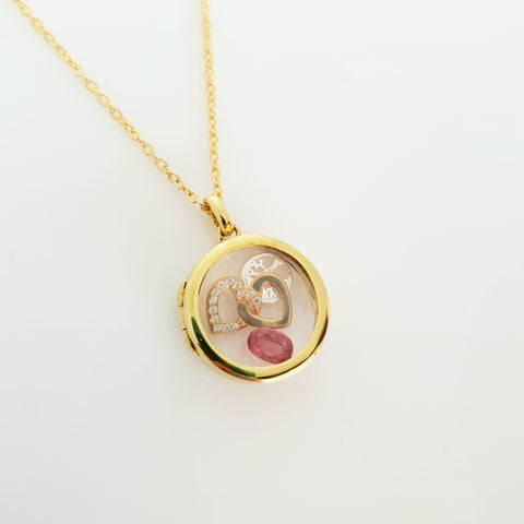 Sterling silver gold plated 20mm  locket.