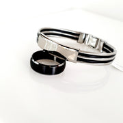 Steel and rubber men's bangle.