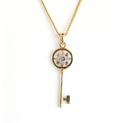 9ct gold diamond set key pendant
