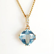 9ct blue topaz and diamond pendant