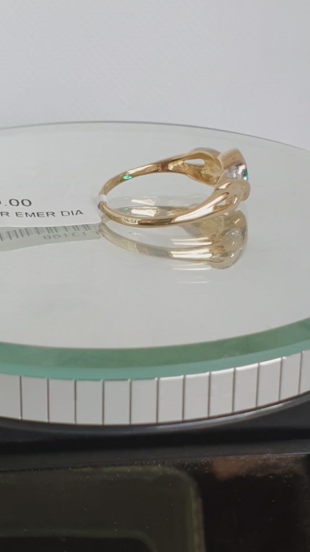 9ct yellow gold diamond and created emerald ring.