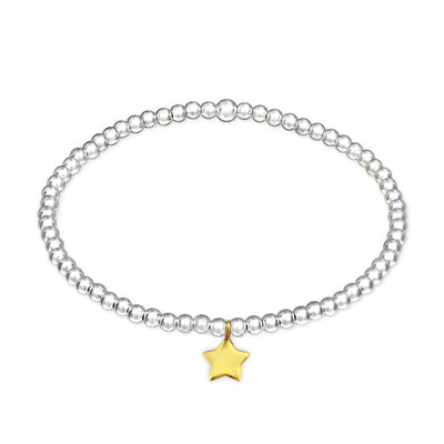 Ball stretch bracelet with gold plated star charm.
