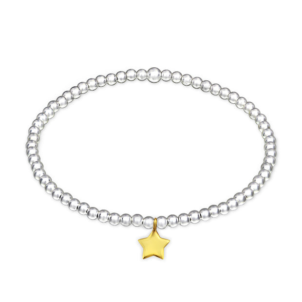 Ball stretch bracelet with gold plated star charm.