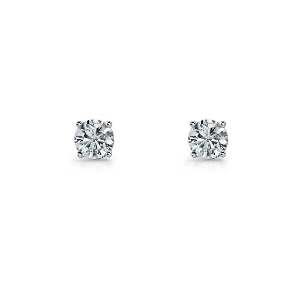 Sterling silver CZ studs.