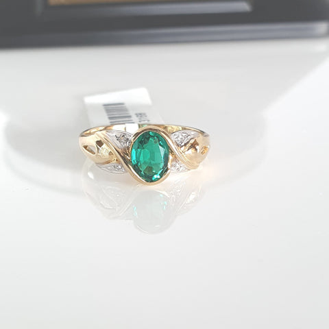 9ct yellow gold diamond and created emerald ring.