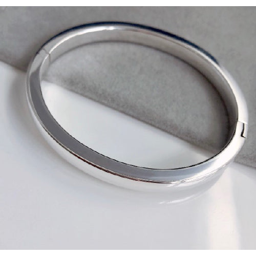 Sterling silver hollow hinged bangle